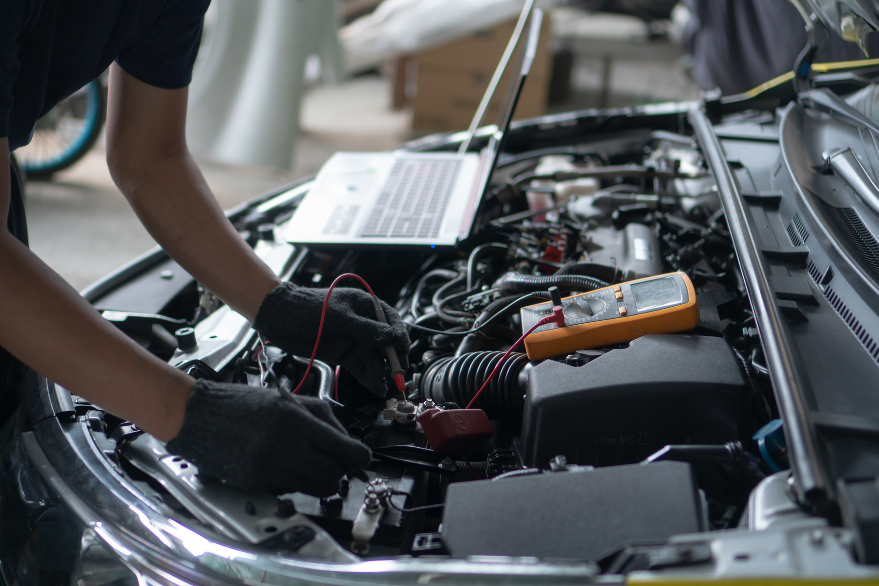 Car repair and maintenance. Performing engine diagnostics